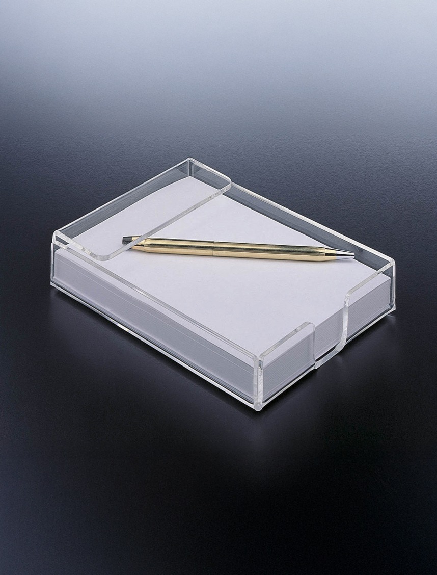 Clear acrylic notepad holder with blank paper and a gold pen on a dark surface, ideal for organized note-taking or desktop decoration.