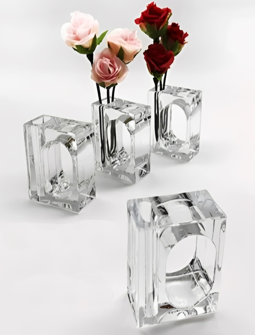 Four transparent glass vases hold pink and red artificial roses. The elegant design highlights floral arrangements, perfect for decorative purposes.