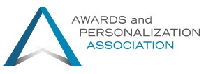 Logo of the Awards and Personalization Association, featuring an abstract triangular design and the organization's name, emphasizing its focus on awards and personalization industries.